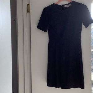 Ann Taylor Loft Petite size 0P black pleated dress with back long gold zipper.